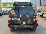 Toyota Land Cruiser 2003 года за 10 900 000 тг. в Караганда – фото 4