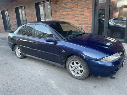 Mitsubishi Carisma 1998 года за 1 350 000 тг. в Астана – фото 2