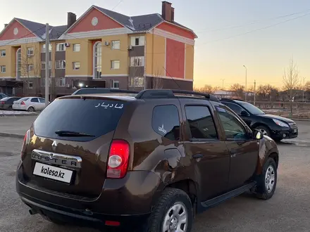 Renault Duster 2014 года за 4 900 000 тг. в Актобе – фото 5