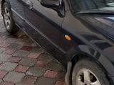 Mazda 323 1998 года за 2 000 000 тг. в Алматы – фото 4