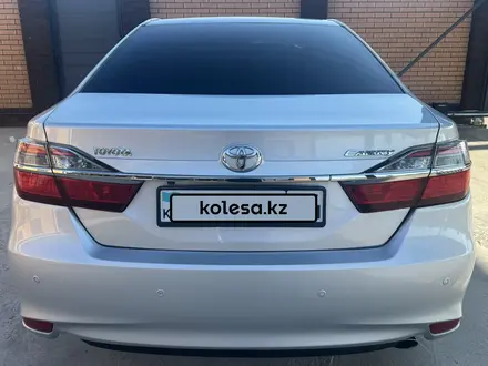 Toyota Camry 2015 года за 9 800 000 тг. в Актобе – фото 9