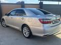 Toyota Camry 2015 годаүшін9 800 000 тг. в Актобе – фото 7