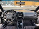 Mazda 323 1999 года за 1 500 000 тг. в Зайсан – фото 3