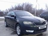Skoda Rapid 2014 года за 3 100 000 тг. в Састобе