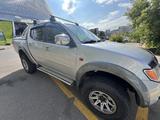 Mitsubishi L200 2008 года за 7 300 000 тг. в Астана – фото 2