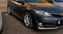 Toyota Camry 2013 года за 7 700 000 тг. в Жанаозен