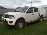 Mitsubishi L200 2014 года за 5 200 000 тг. в Актобе