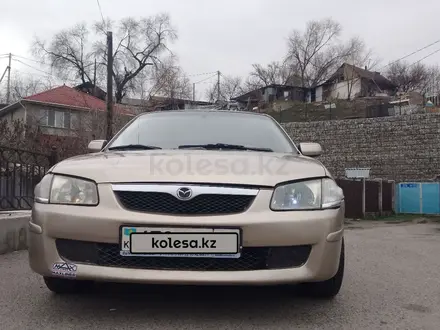 Mazda 323 1999 года за 2 100 000 тг. в Алматы – фото 10