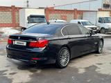 BMW 750 2011 года за 13 500 000 тг. в Алматы – фото 2