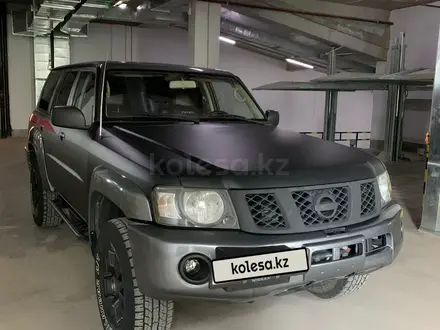 Nissan Patrol 2008 года за 11 300 000 тг. в Астана – фото 2