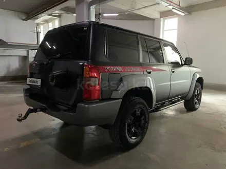 Nissan Patrol 2008 года за 11 300 000 тг. в Астана – фото 21