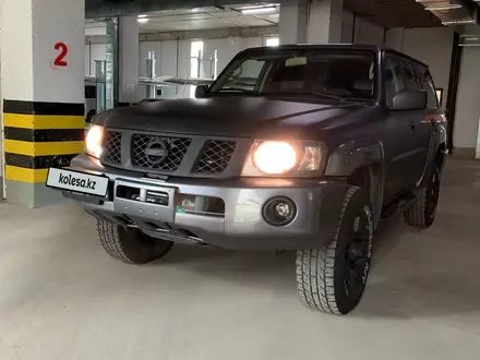 Nissan Patrol 2008 года за 11 300 000 тг. в Астана – фото 27