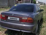 Mazda 323 1998 года за 1 899 999 тг. в Алматы – фото 4