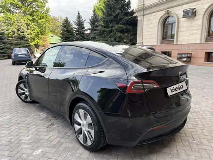 Tesla Model Y 2022 года за 14 950 000 тг. в Алматы – фото 5