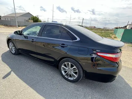 Toyota Camry 2015 года за 6 900 000 тг. в Кульсары – фото 7