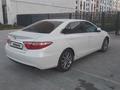 Toyota Camry 2016 года за 11 399 999 тг. в Кульсары – фото 34