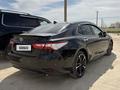 Toyota Camry 2020 года за 12 500 000 тг. в Жанаозен – фото 2