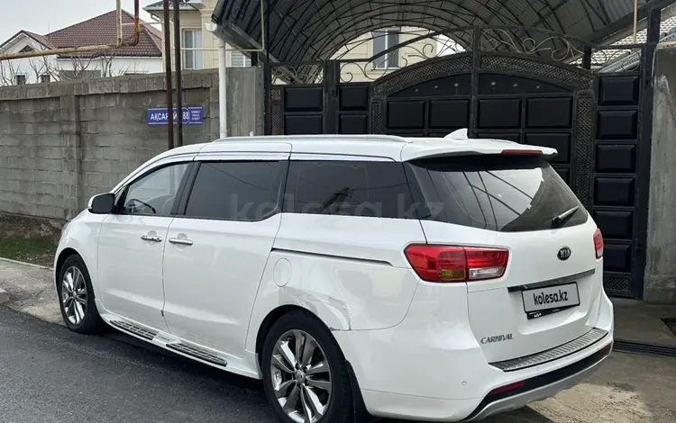 Kia Carnival 2015 года за 9 900 000 тг. в Шымкент