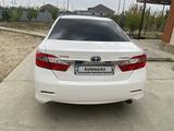 Toyota Camry 2014 годаfor8 900 000 тг. в Атырау – фото 2