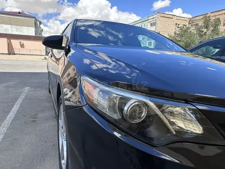 Toyota Camry 2014 года за 5 600 000 тг. в Жанаозен – фото 20