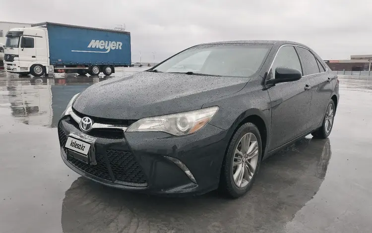 Toyota Camry 2014 года за 9 300 000 тг. в Караганда