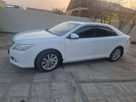 Toyota Camry 2014 года за 10 500 000 тг. в Жанаозен – фото 3