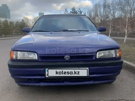 Mazda 323 1993 года за 900 000 тг. в Астана – фото 2