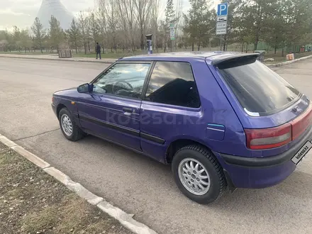 Mazda 323 1993 года за 900 000 тг. в Астана – фото 3