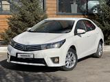 Toyota Corolla 2014 года за 6 690 000 тг. в Караганда