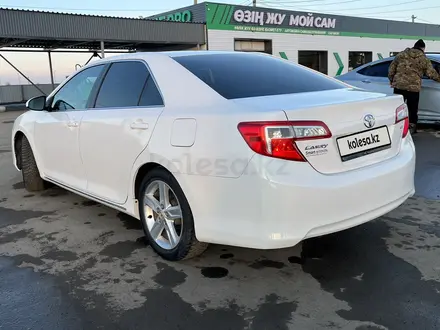 Toyota Camry 2012 года за 8 400 000 тг. в Актобе – фото 2