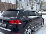 Volkswagen Touareg 2011 годаfor12 700 000 тг. в Астана