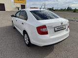 Skoda Rapid 2013 года за 3 400 000 тг. в Астана – фото 4