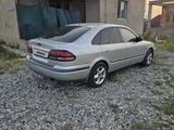 Mazda 626 1997 года за 1 550 000 тг. в Шымкент – фото 4