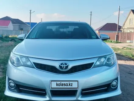 Toyota Camry 2013 года за 5 700 000 тг. в Актобе