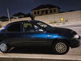 Mazda 323 1996 годаүшін700 000 тг. в Шымкент – фото 2