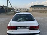 Toyota Carina E 1994 года за 1 500 000 тг. в Байконыр – фото 3