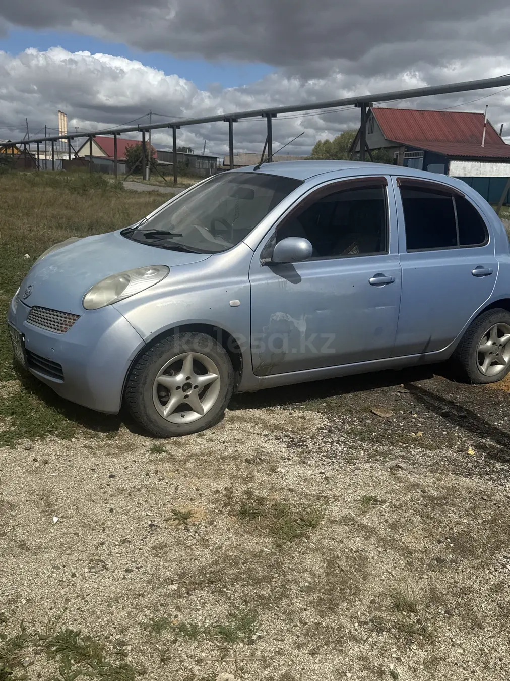 Nissan March, 2004
