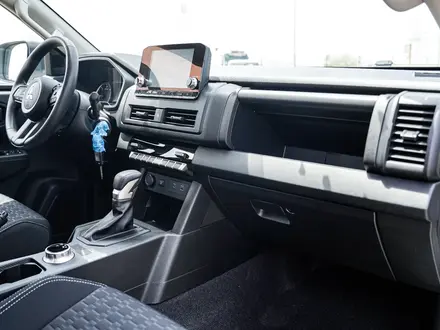 Mitsubishi L200 DC Invite 2026 года за 11 410 690 тг. в Алматы – фото 8