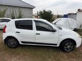 Renault Sandero 2012 года за 1 900 000 тг. в Уральск – фото 2