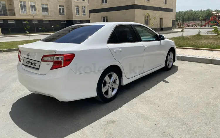 Toyota Camry 2013 годаfor8 500 000 тг. в Атырау