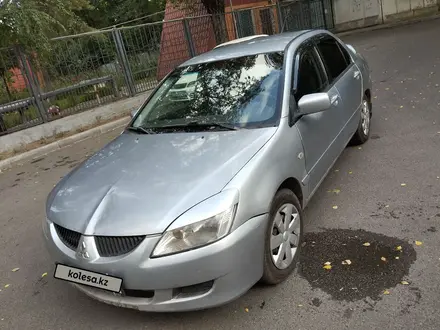 Mitsubishi Lancer 2005 года за 1 750 000 тг. в Алматы – фото 2