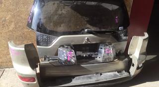 Дверь багажника Mitsubishi Outlander за 1 000 тг. в Караганда