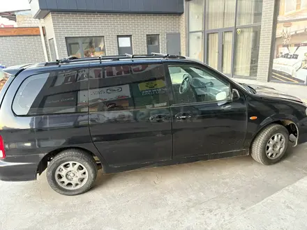 Kia Carnival 2001 года за 1 400 000 тг. в Шымкент – фото 4