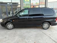 Kia Carnival 2001 годаfor1 400 000 тг. в Шымкент