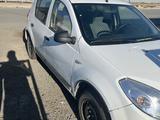 Renault Sandero 2012 года за 2 750 000 тг. в Атырау – фото 2