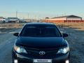 Toyota Camry 2013 года за 7 800 000 тг. в Атырау – фото 2