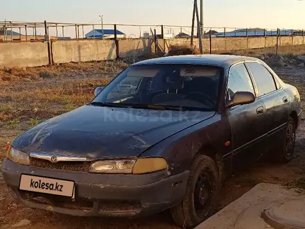 Mazda 626 1996 года за 400 000 тг. в Атырау – фото 2