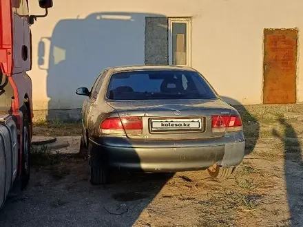 Mazda 626 1996 года за 400 000 тг. в Атырау – фото 3