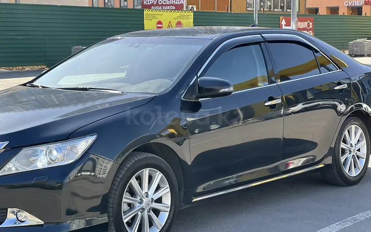 Toyota Camry 2014 года за 9 800 000 тг. в Астана