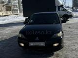 Mitsubishi Lancer 2006 годаүшін2 200 000 тг. в Жезказган